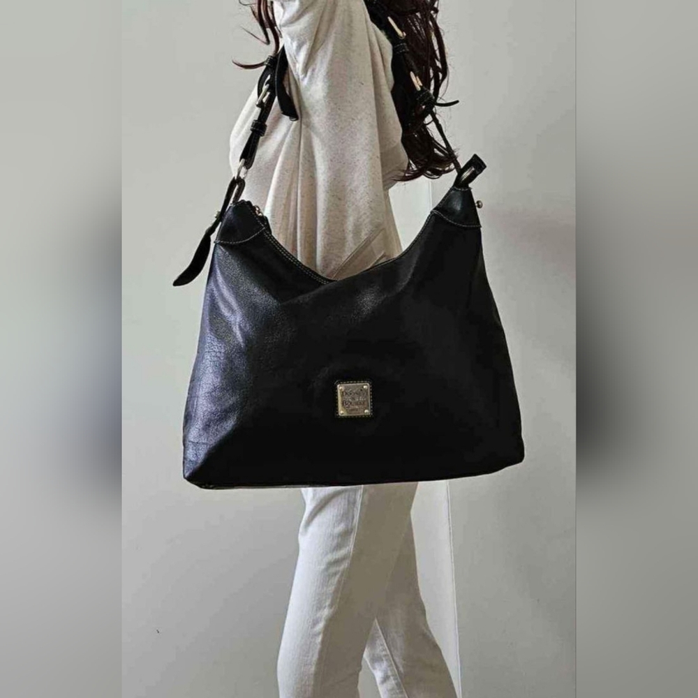 Dooney and bourke L black leather Shoulder bag DO NOT BUY for private sale only